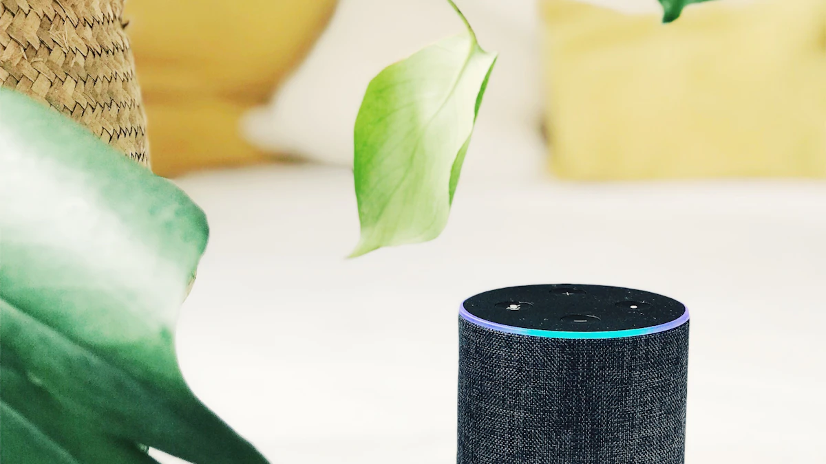 Black Amazon Echo smart speaker on a white panel, part of the Alexa family that now includes the larger Echo Show 16