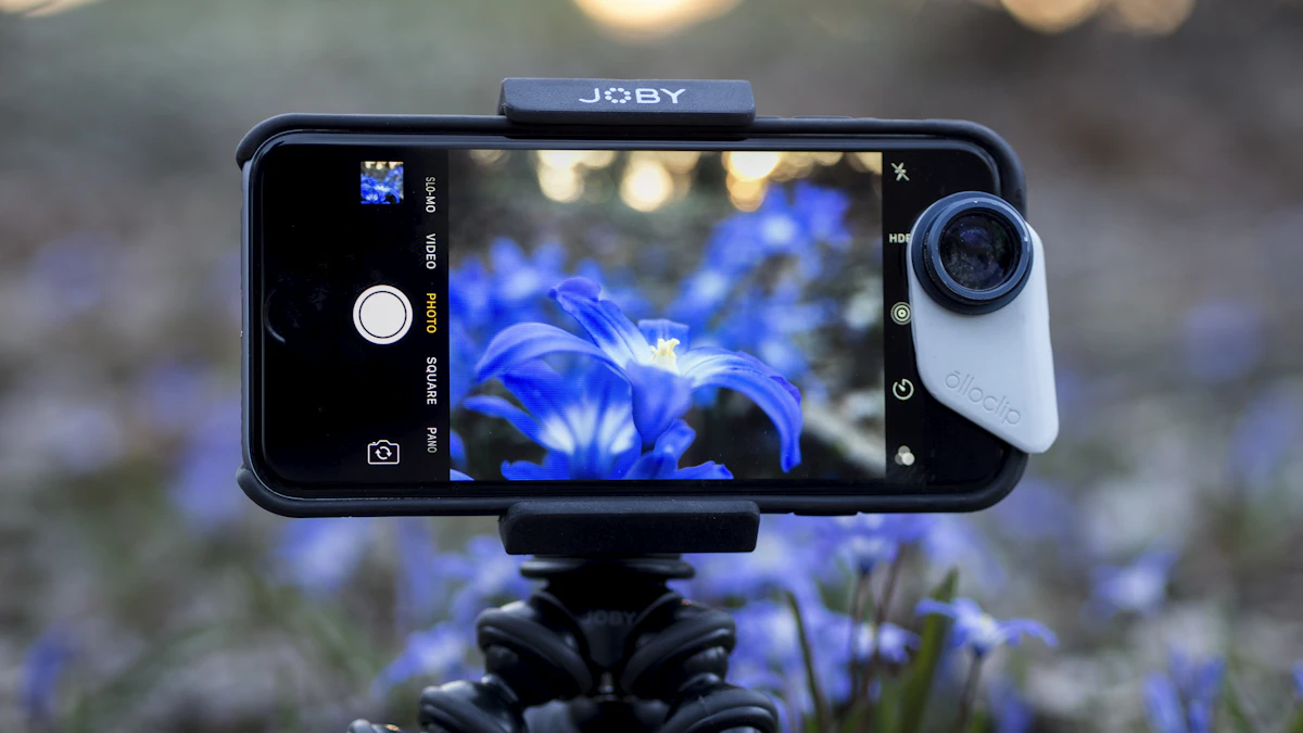 Smartphone held close to a blue flower, framing a detailed close-up shot with its rear camera