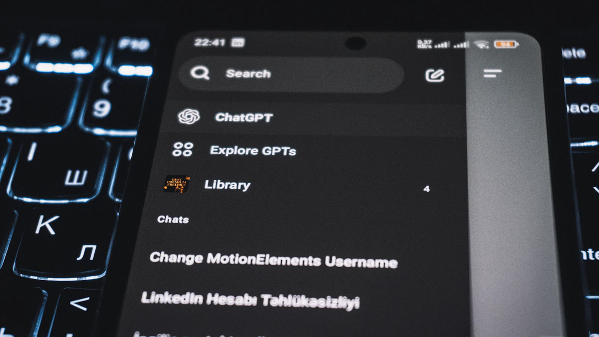Smartphone showing the ChatGPT app interface resting on a keyboard, used to compare ChatGPT Plus and Free