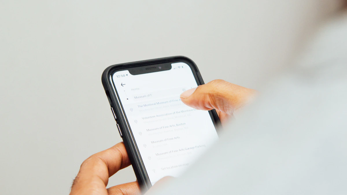 Person holding an iPhone and checking messages after tapping a suspicious link in a text