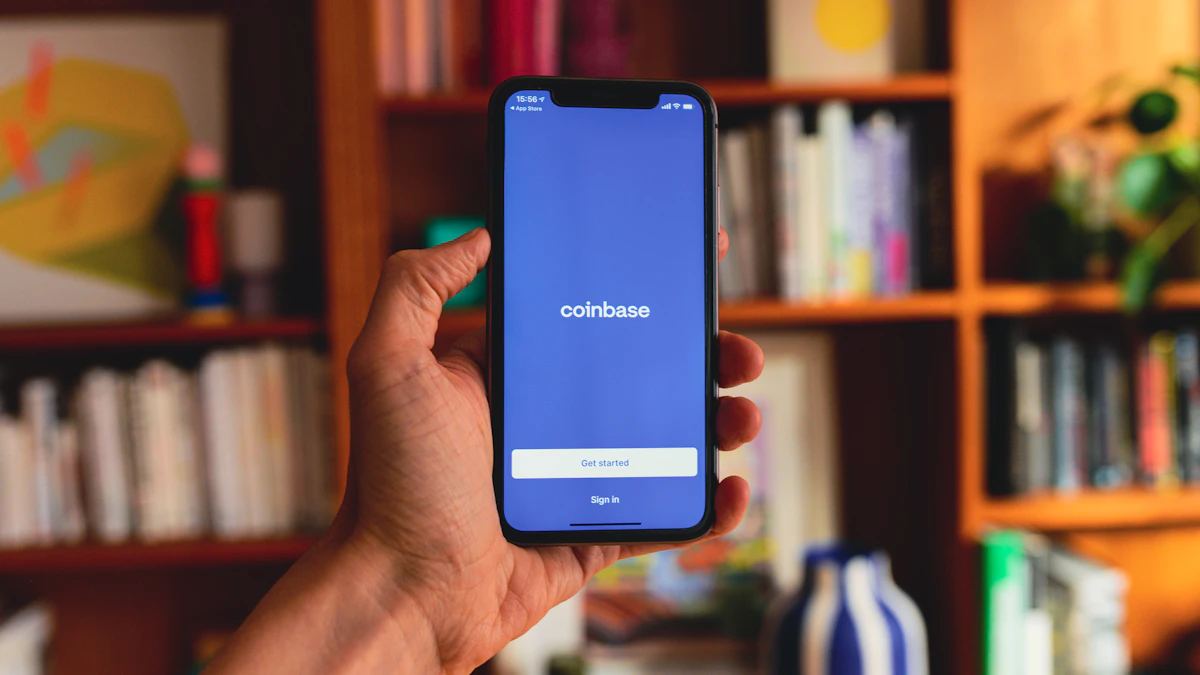 Person holding a phone with a crypto wallet app open, as Coinbase users watch for phishing after the Amplitude incident