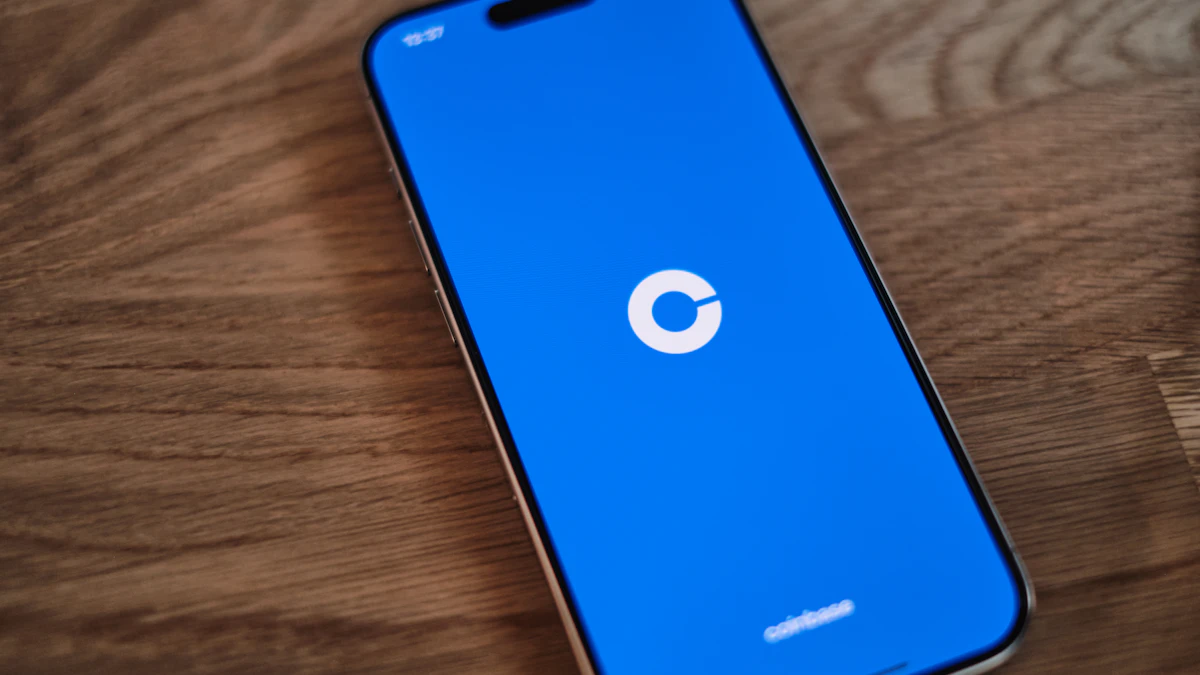 Smartphone on a wooden table showing a crypto exchange app, as Coinbase adds Ripple's RLUSD stablecoin