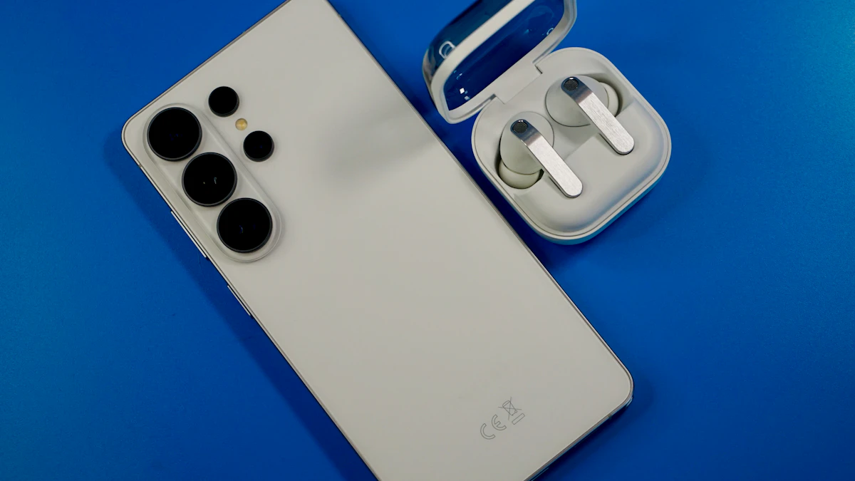 White smartphone and wireless earbuds on a blue background, a setup like the one Samsung Galaxy Buds On owners will use