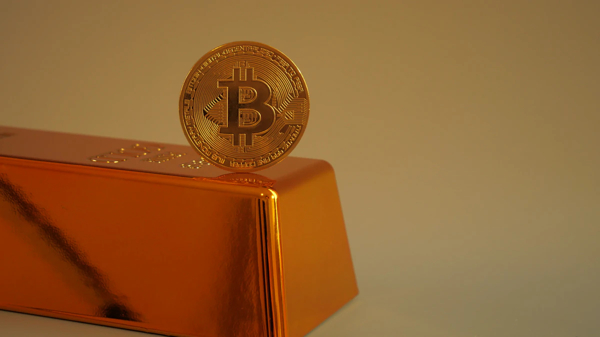 Gold bitcoin coin resting on a gold bar, a common way to picture how bitcoin gets its value compared with gold