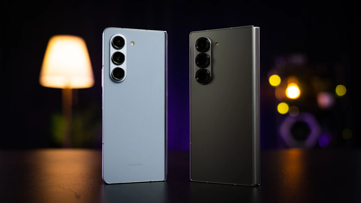 Two foldable smartphones side by side on a table, the type of hinged design behind the iPhone Duo inner screen crack reports