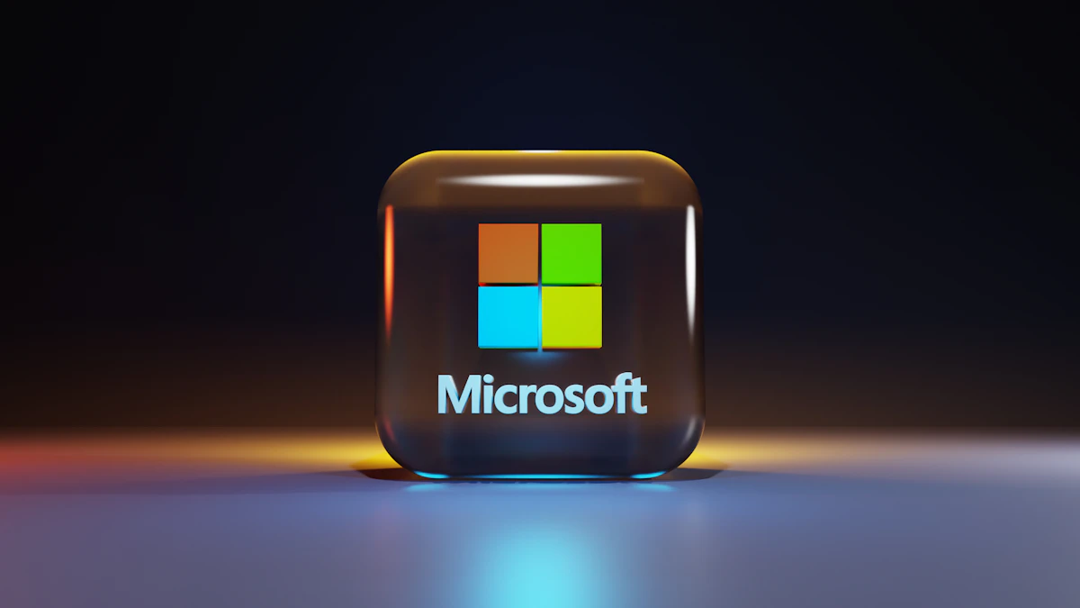 Glossy glass cube bearing the Microsoft logo on a dark surface, tied to the company's new voluntary exit offer for staff