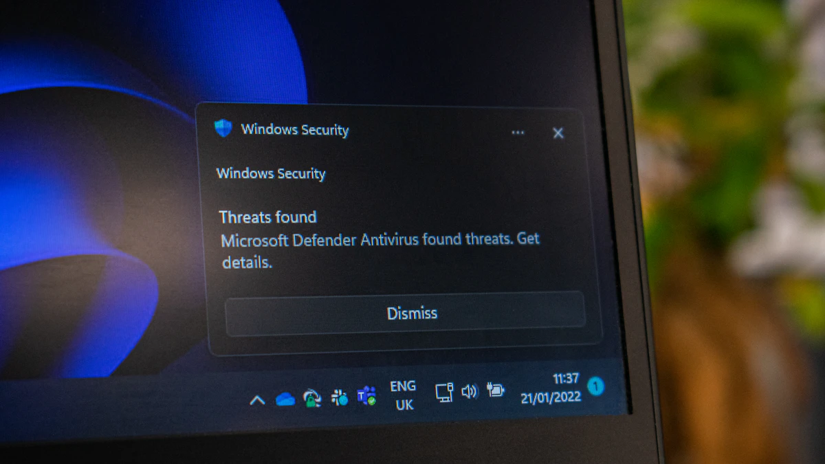Laptop screen with the Windows Security button highlighted, the starting point for scanning a PC and removing a virus